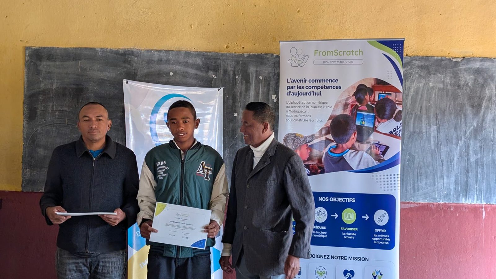 A student receiving his FromScratch certificate in 2026