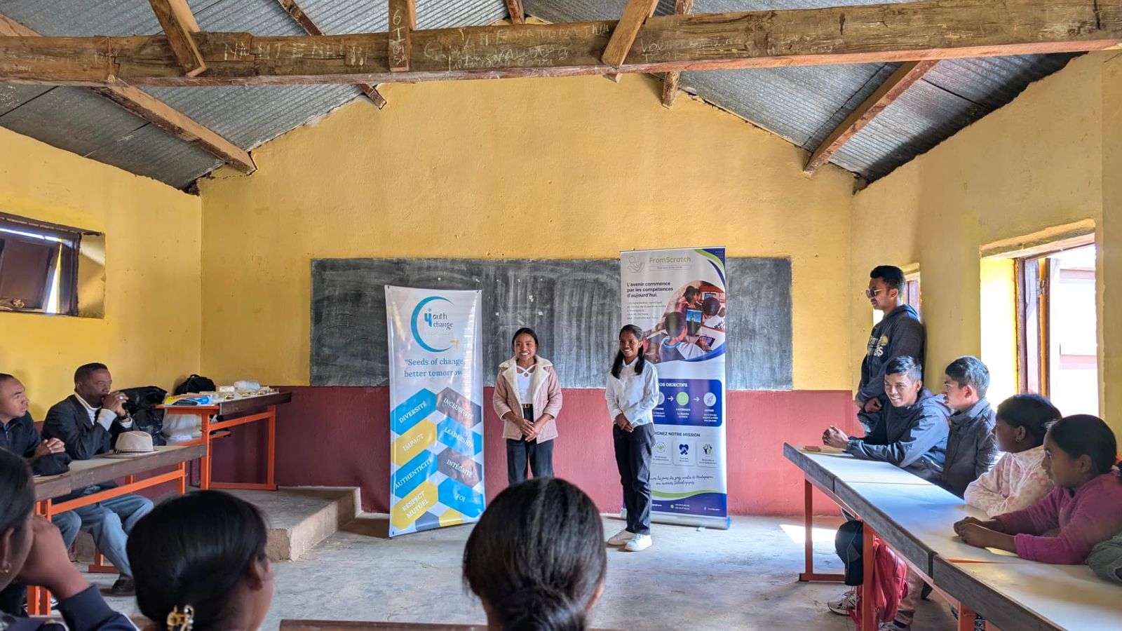Two trainers presenting FromScratch to a classroom, 2026